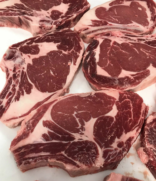 Bone-in ribeye steaks cut to order