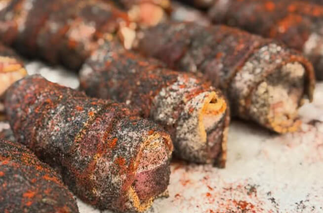 Bacon-wrapped, rub-dusted bites fresh from the smoker